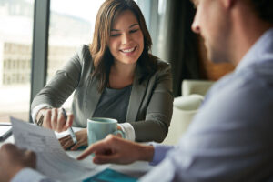business people reviewing document